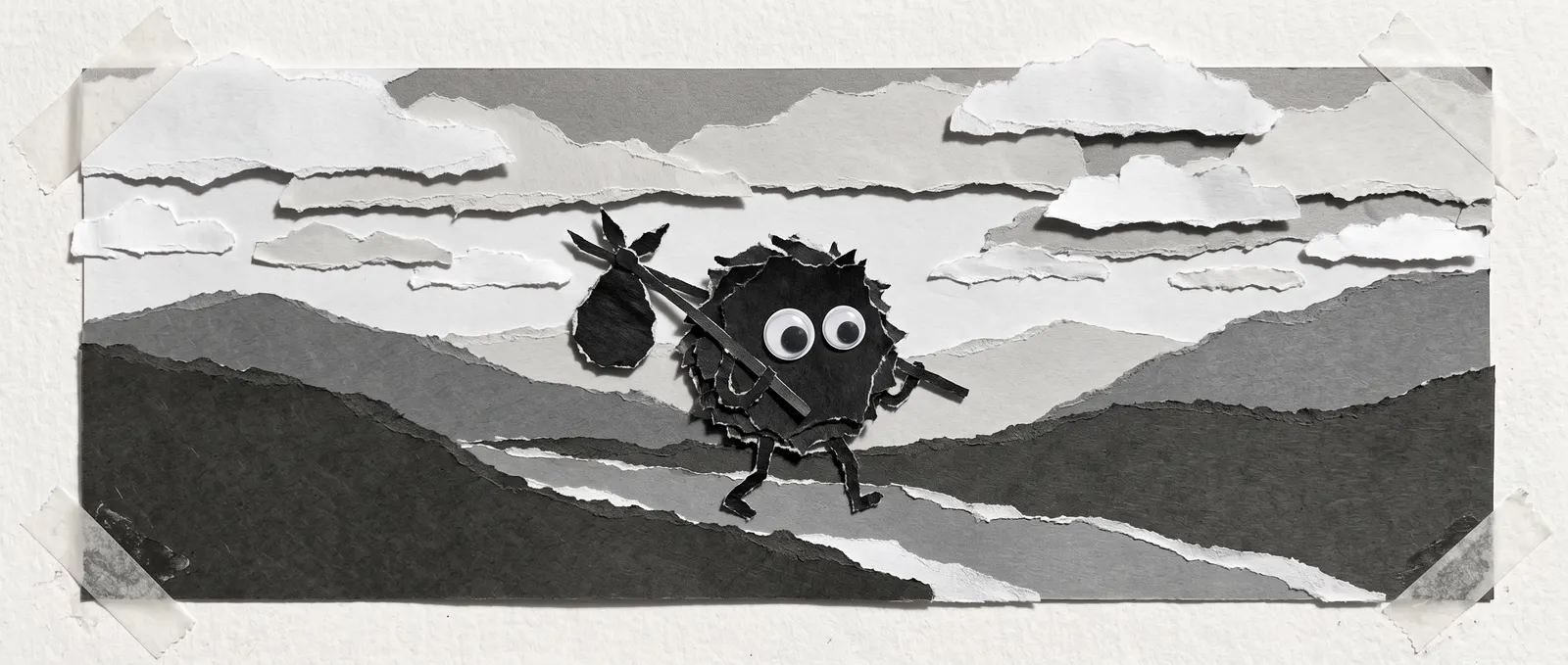 Paper-cutout collage of Bo walking through torn-paper hills