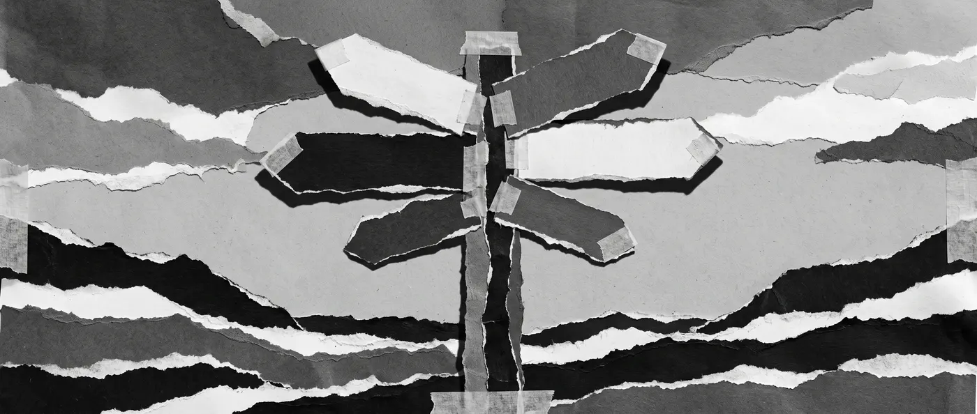 Paper collage of a crossroads signpost